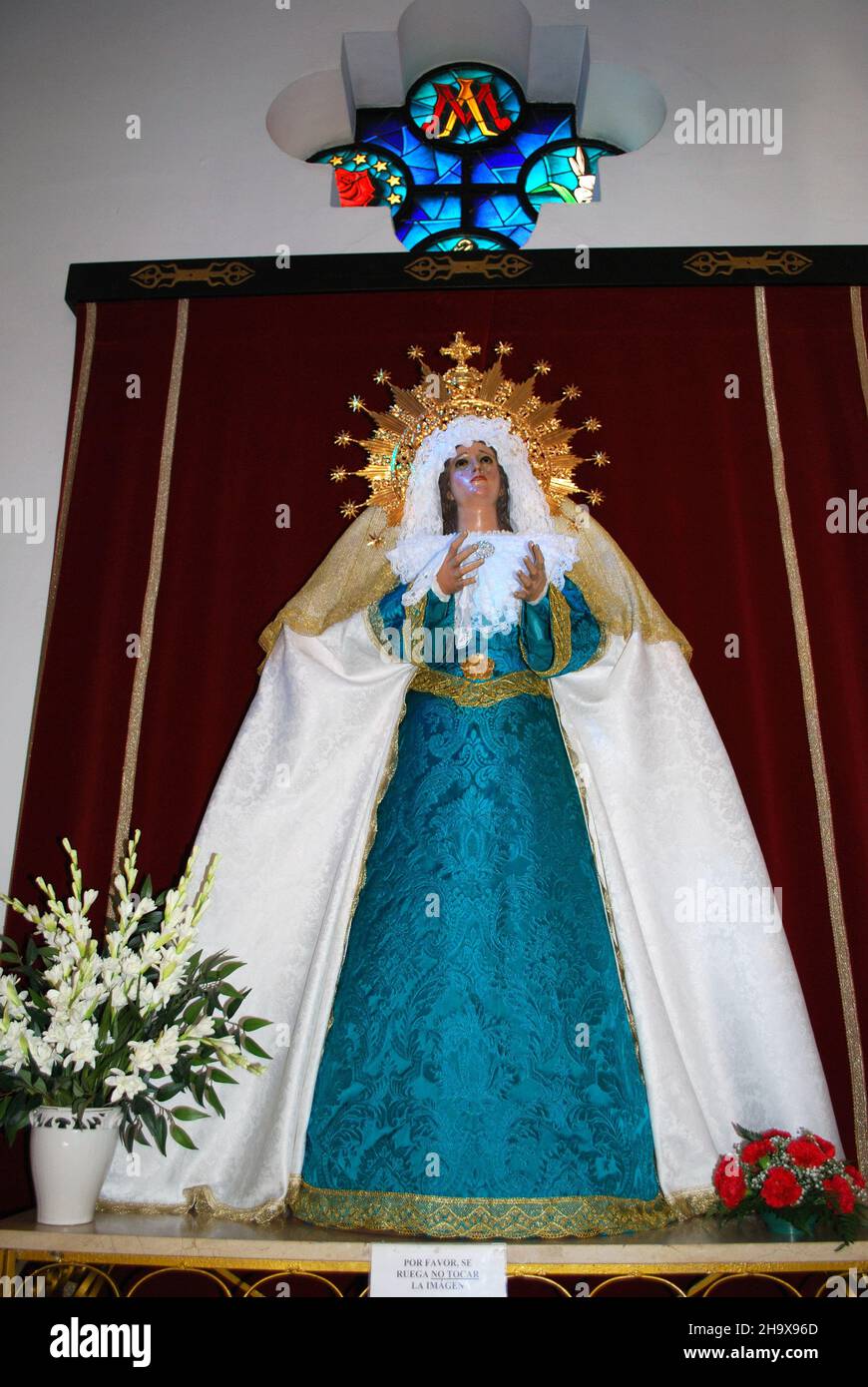 Religious statue inside El Rosario church, Fuengirola, Spain. Stock Photo