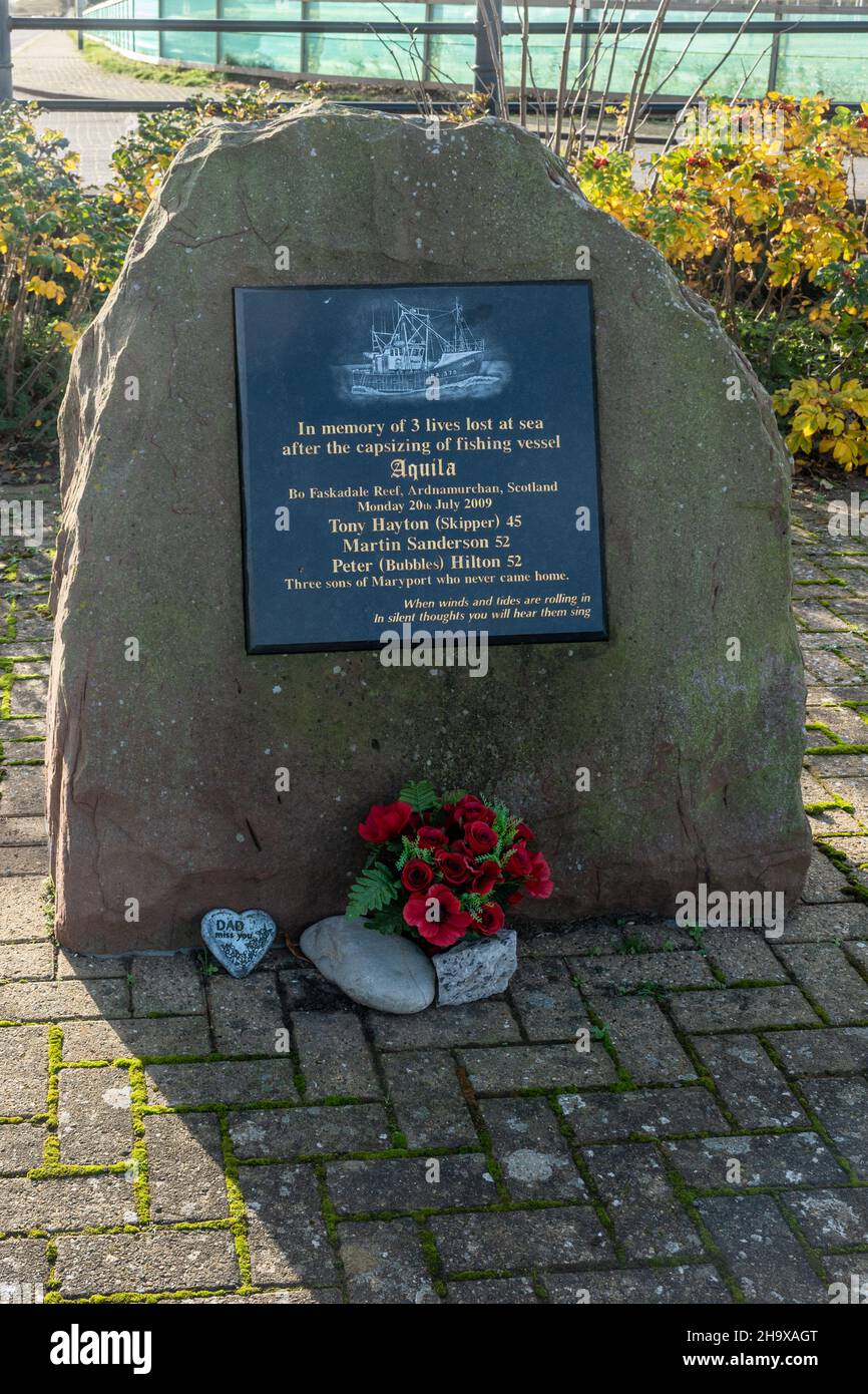 Memorial stone commemorating 3 lives lost after the capsizing of fishing boat Aquila in 2009, Maryport, Cumbria, England, UK Stock Photo