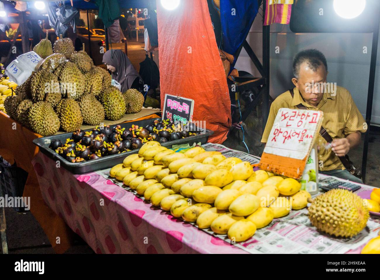 KOTA KINABALU, MALAYSIA FEBRUARY 24, 2018 Fruit stall at the night