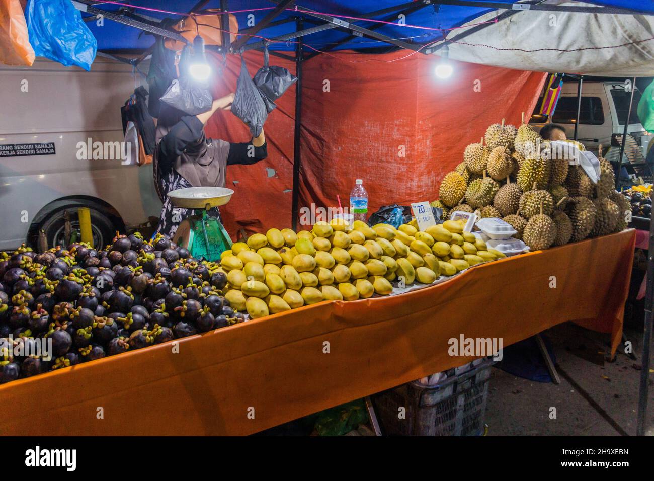 KOTA KINABALU, MALAYSIA FEBRUARY 24, 2018 Fruit stall at the night