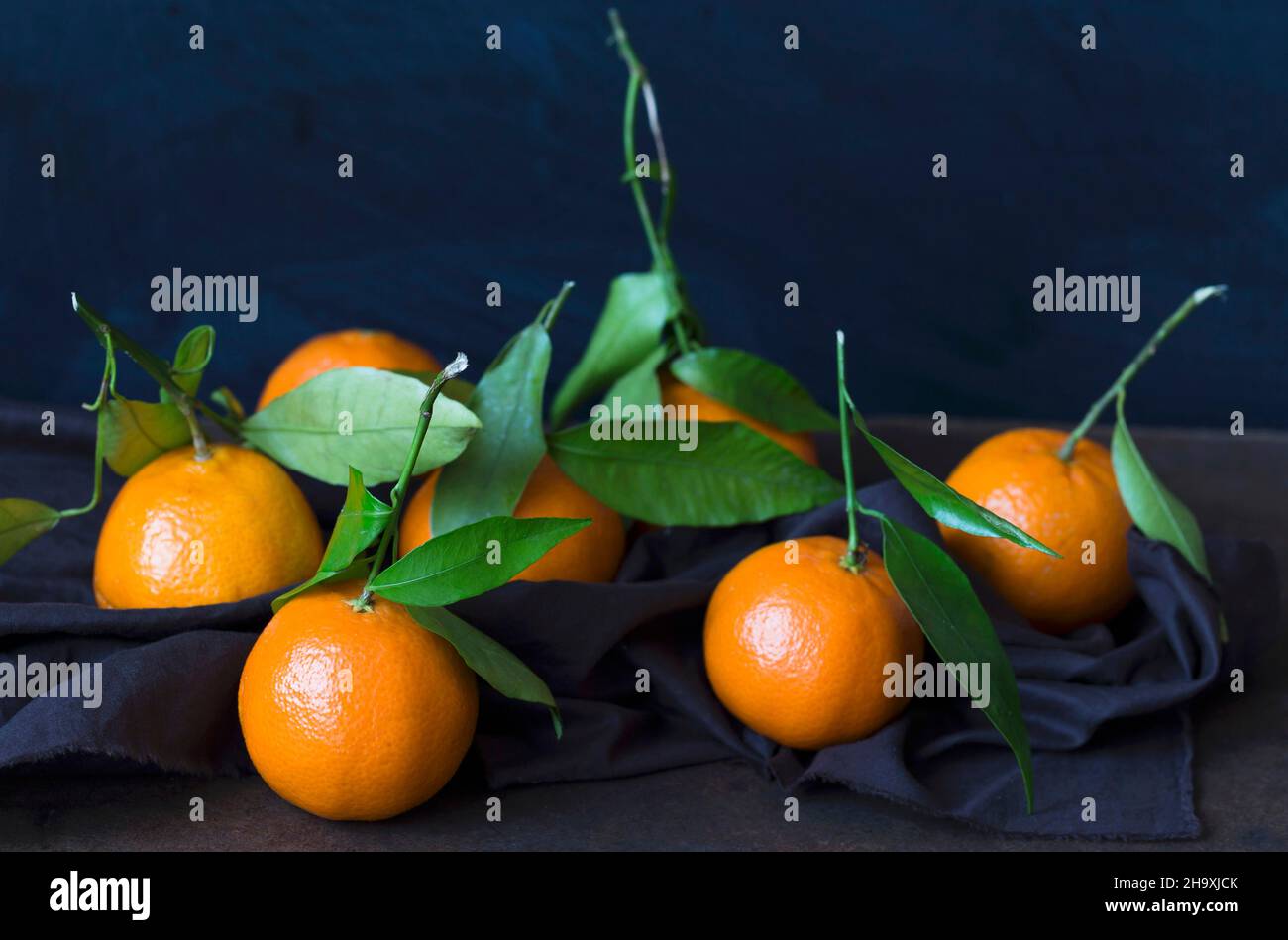 Clementines with leaves Stock Photo Alamy