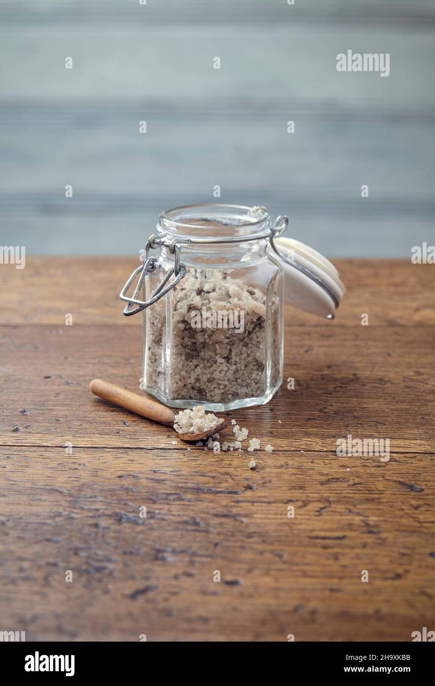 Vanilla & lavender salt in a glass jar with a swing-top Stock Photo