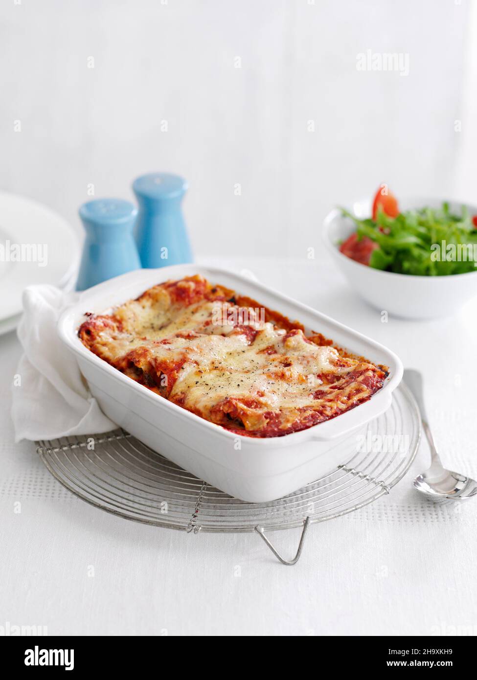 Cannelloni in a baking dish Stock Photo - Alamy