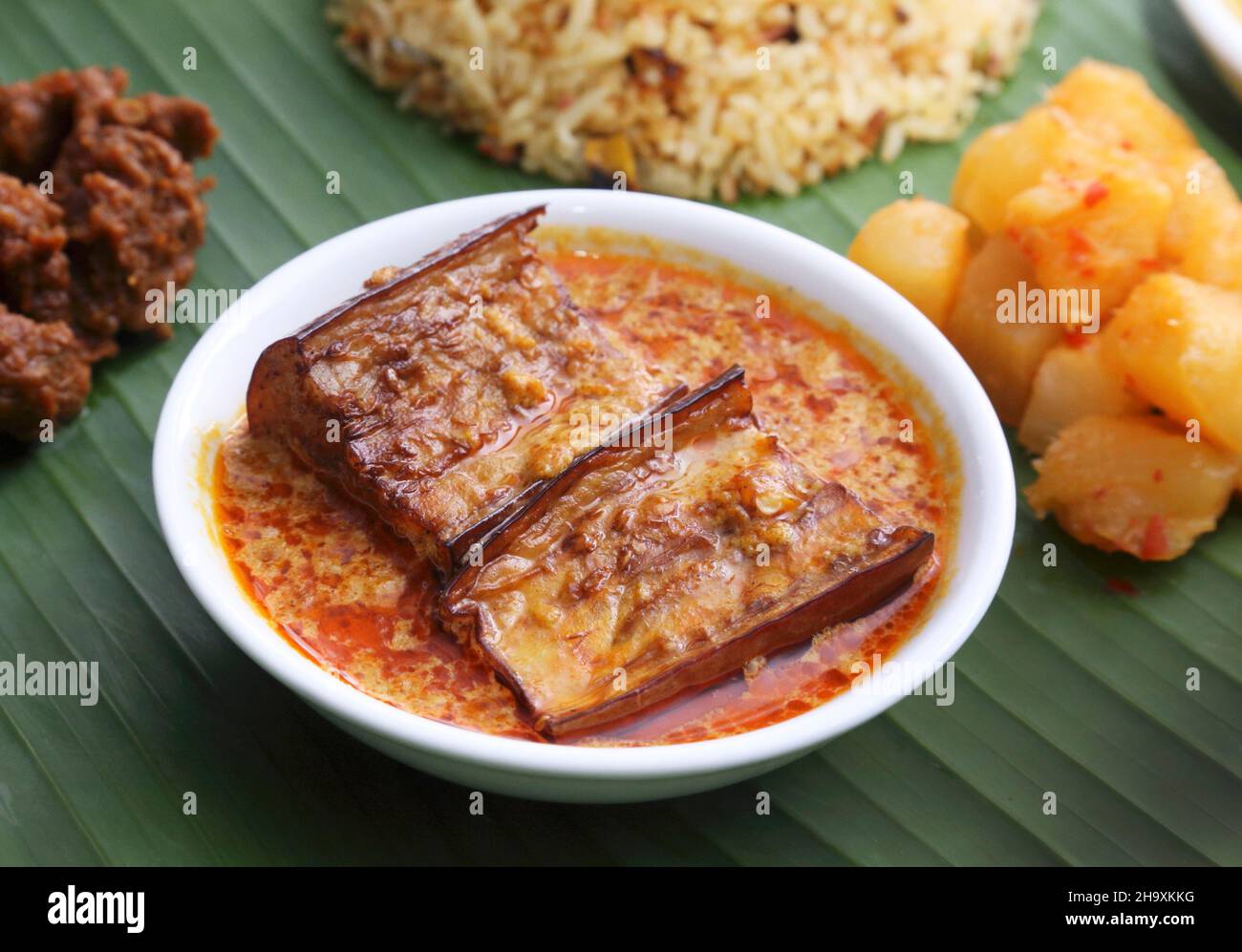 Nyonya cuisine: aubergines in a curry and coconut sauce (Malaysia) Stock Photo