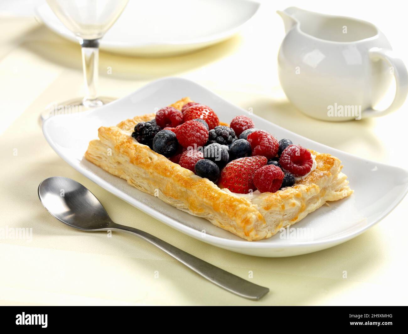 summer fruits and cream in puff pastry Stock Photo