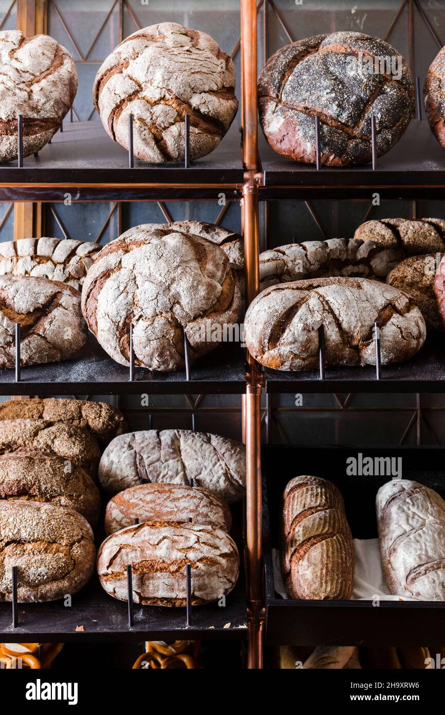 Artisan wood-fired bread loaves on shelves Stock Photo - Alamy