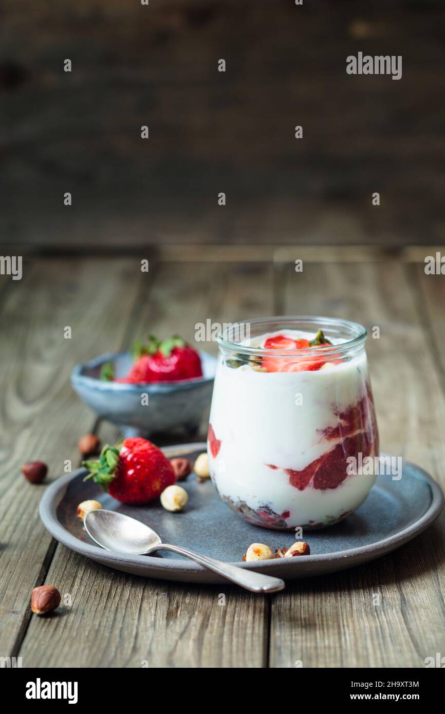 Greek yoghurt with strawberry and chia seed jam, and hazelnuts Stock Photo Alamy