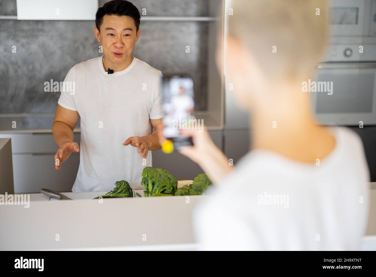 Take Video Asian woman recording video hi-res stock photography and images - Alamy