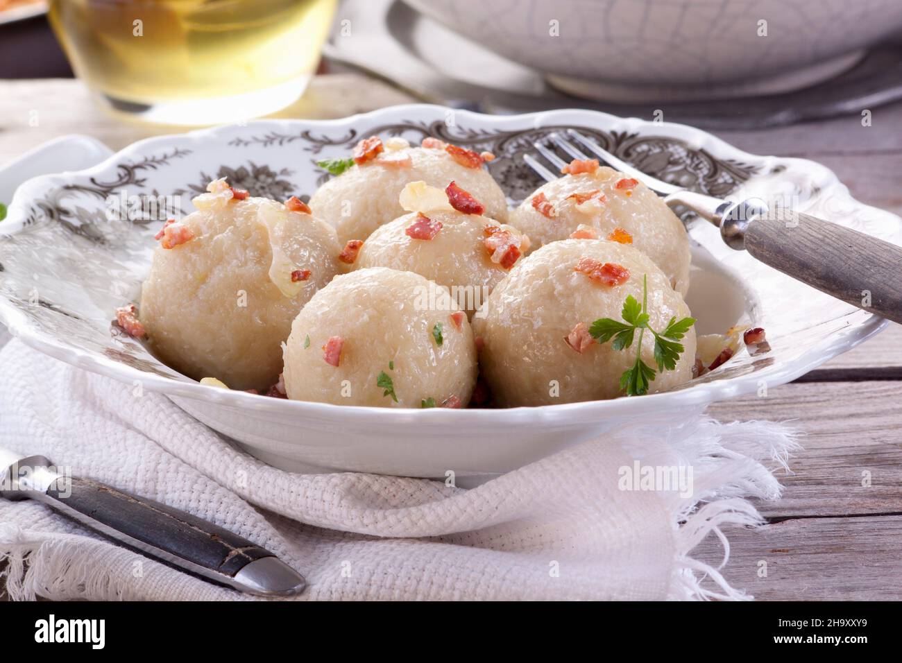Potato dumplings with bacon Stock Photo Alamy