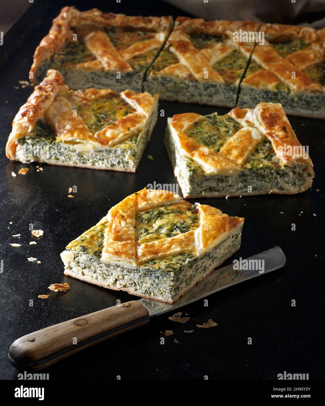Crostata di ricotta puff pastry tart with ricotta and spinach Stock