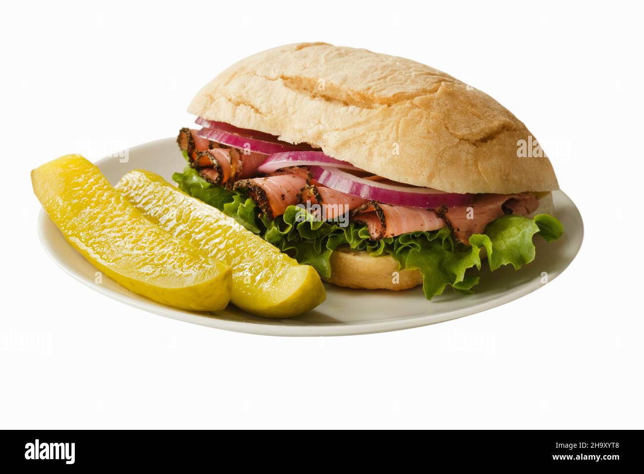 A pastrami sandwich with dill pickles Stock Photo Alamy