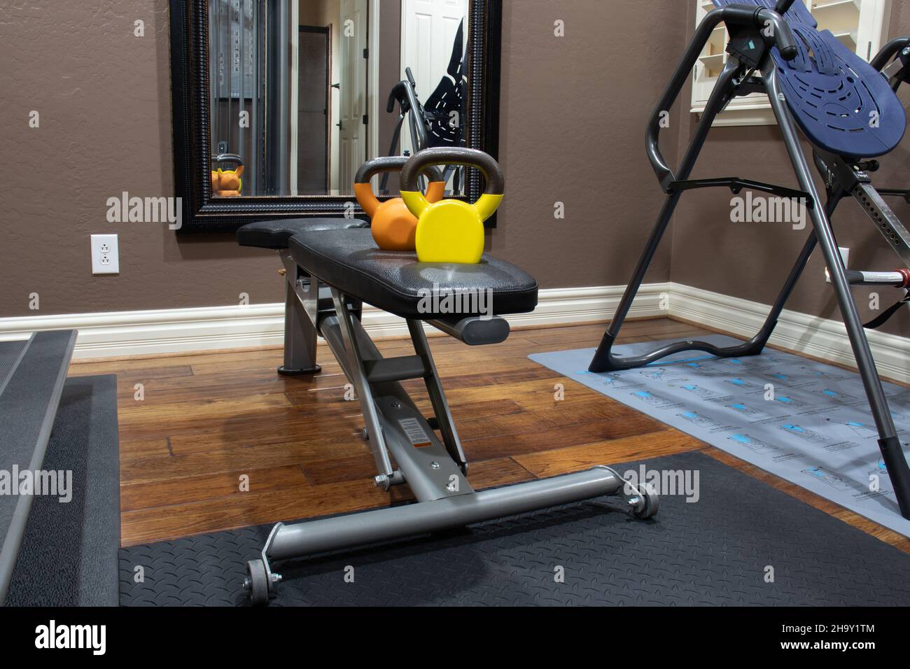 Private home gym in a spare bedroom Stock Photo