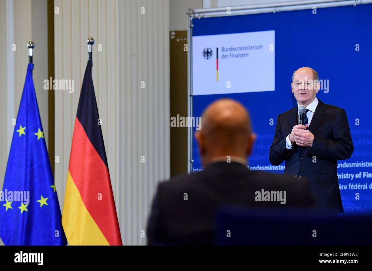 Berlin, Germany. 09th Dec, 2021. Chancellor Olaf Scholz (SPD) speaks during the handover of office to his successor as Federal Finance Minister, Christian Lindner (FDP), at the Federal Ministry of Finance. Credit: Tobias Schwarz/AFP-Pool/dpa/Alamy Live News Stock Photo