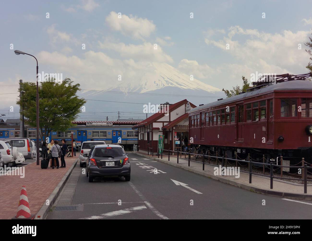 View of Mount Fuji from Kawaguchiko station with clouds in blue sky background. Stock Photo