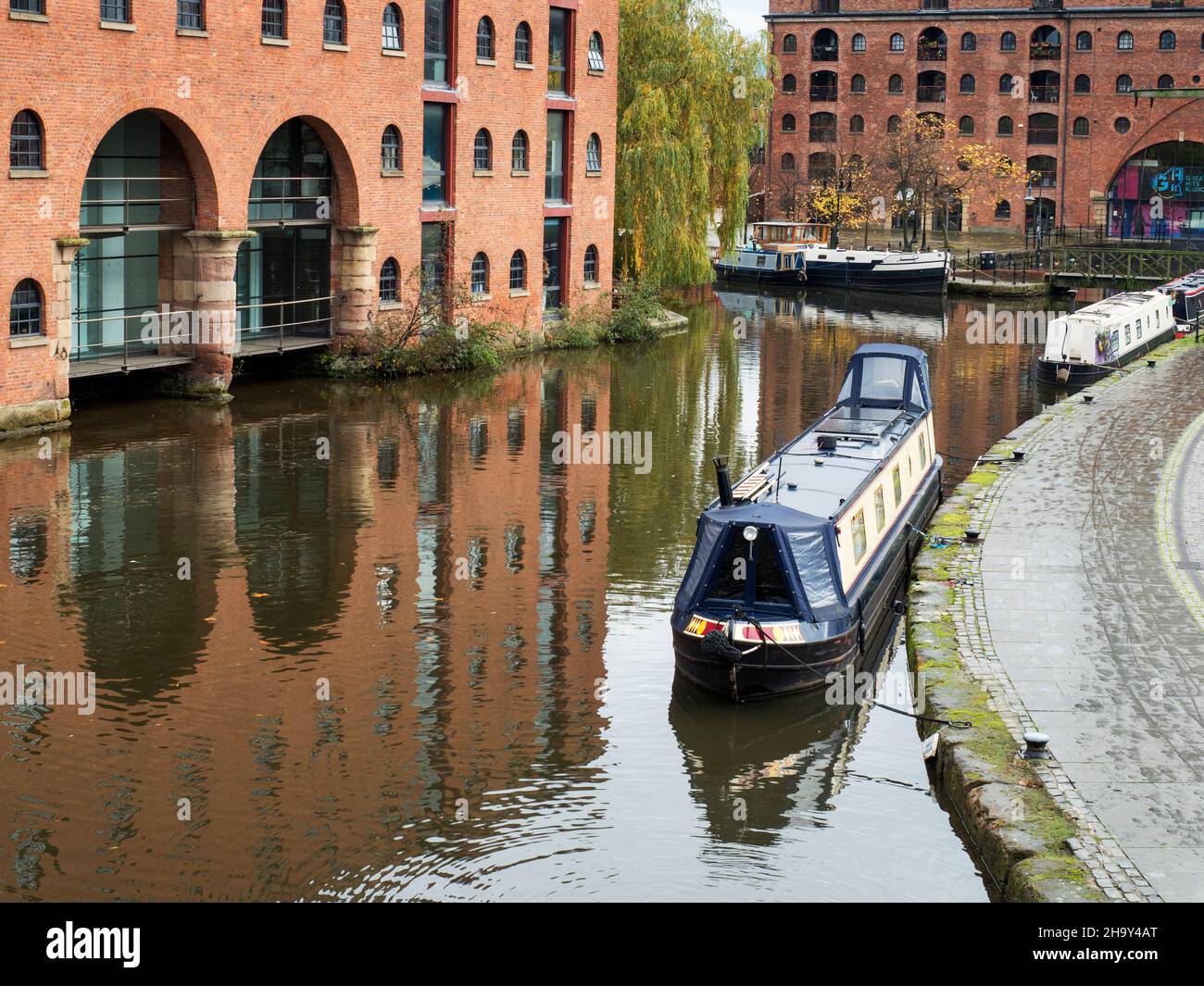 Looking toward Castle Quay and Castlefield Canal Basin from Merchants Bridge in Castlefield Manchester Greater Manchester England Stock Photo