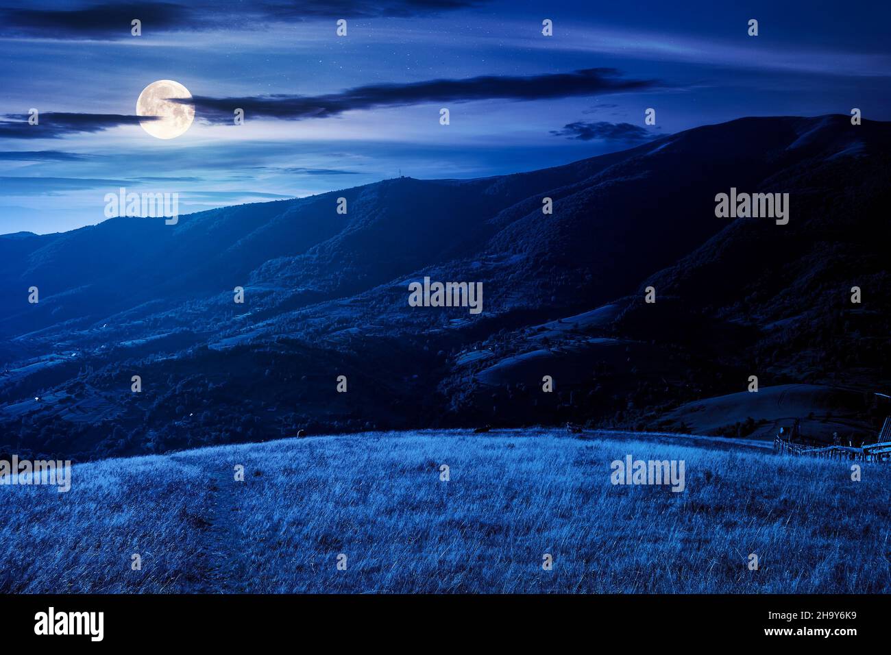Moon Light Countryside landscape of carpathian countryside at night. early autumn or summer ...