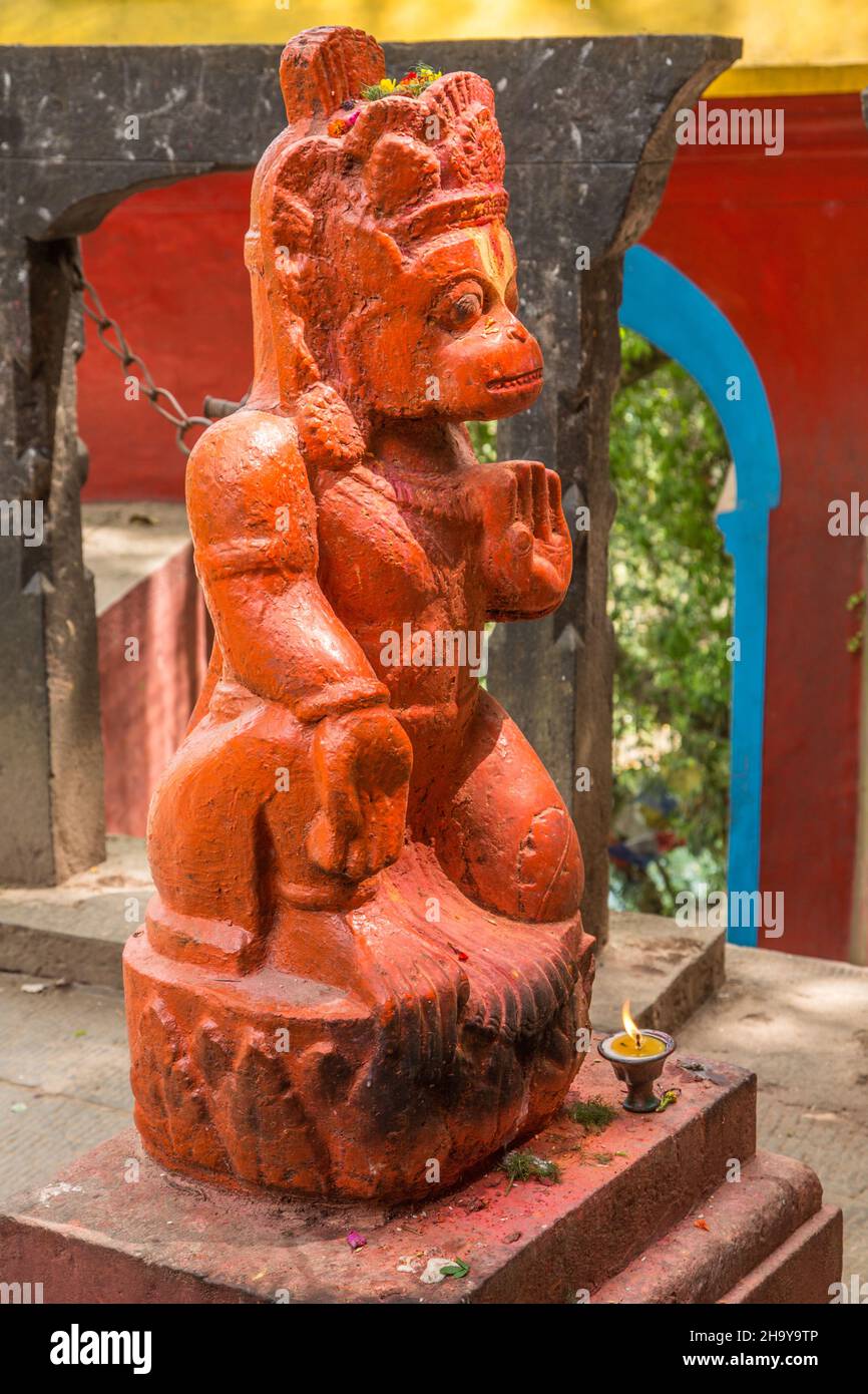 A painted statue of Hanuman, the monkey deity, in the Shesh Narayan Temple.  Pharping, Nepal. Stock Photo