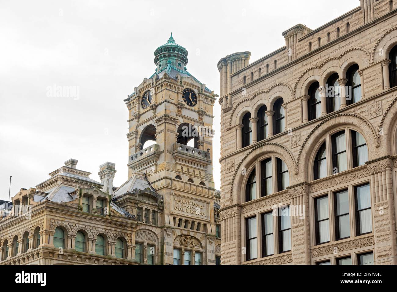two landmark buildings in downtown milwaukee wisconsin of victorian and french second empire architectural styles Stock Photo