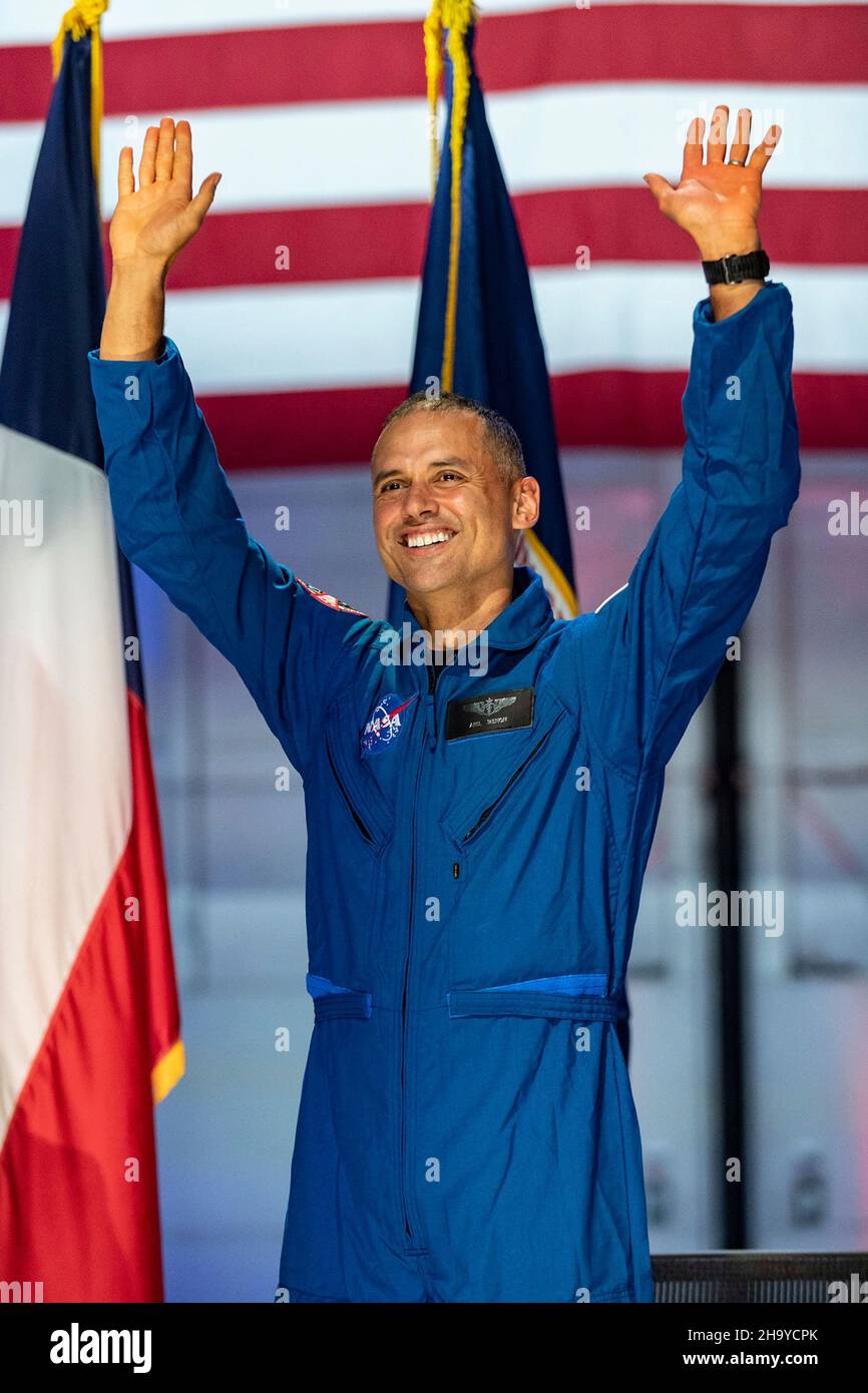 Houston, United States. 06 December, 2021. NASA astronaut candidate Anil Menon, waves after being introduced during an event announcing the new class of 10 candidates at Ellington Field on the Johnson Space Center, December 6, 2021 in Houston, Texas. The new astronaut candidates will begin two years of training in for a chance to be assigned a space mission.  Credit: James Blair/NASA/Alamy Live News Stock Photo