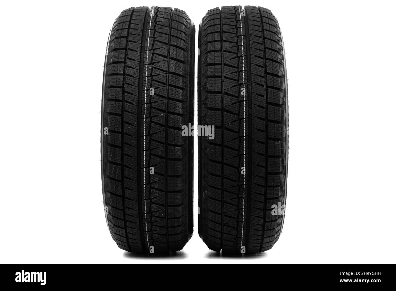 car tires with winter tread on white background Stock Photo Alamy