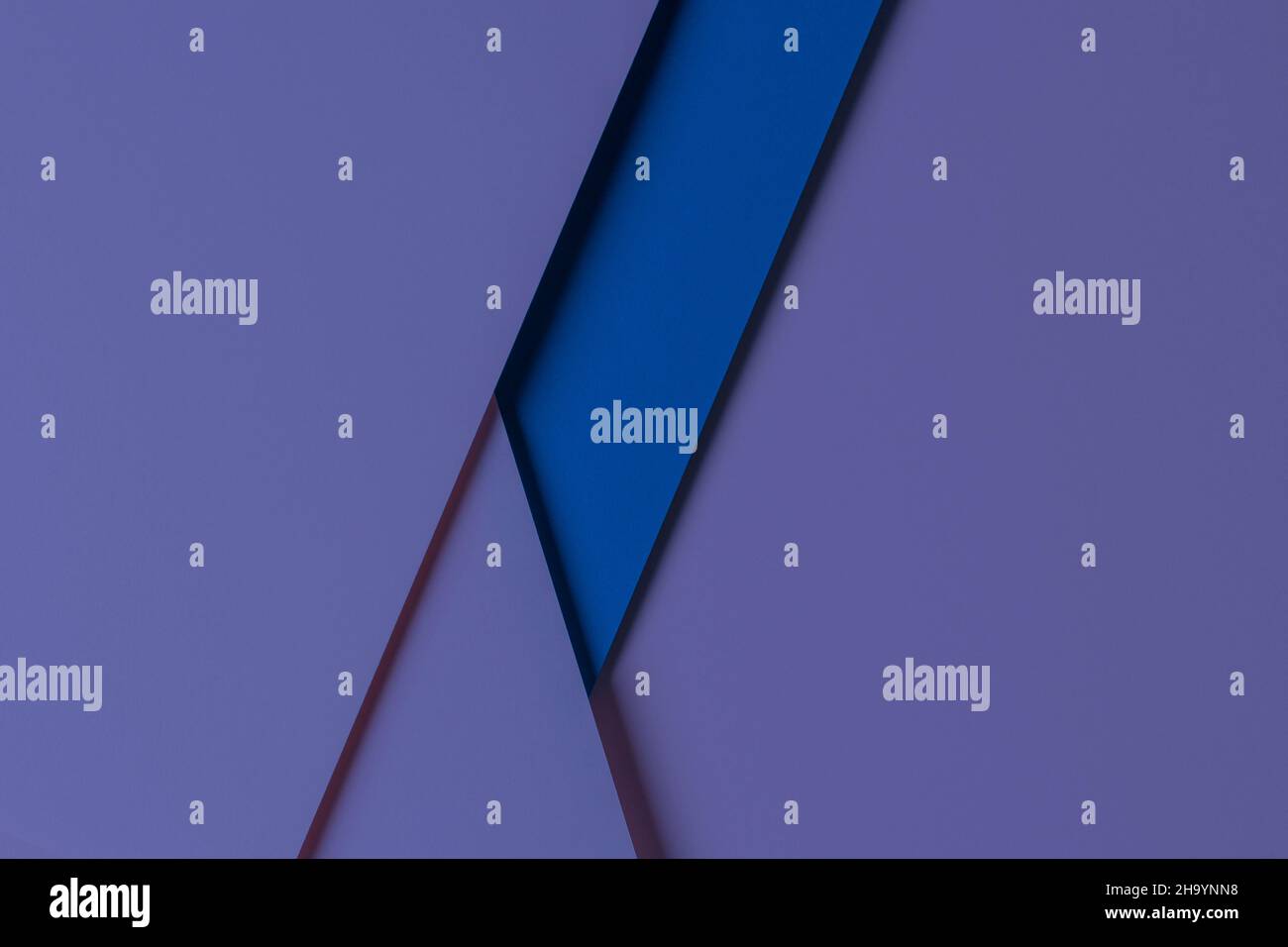 Abstract colored paper geometry composition background in very peri, purple color. Top view Stock Photo