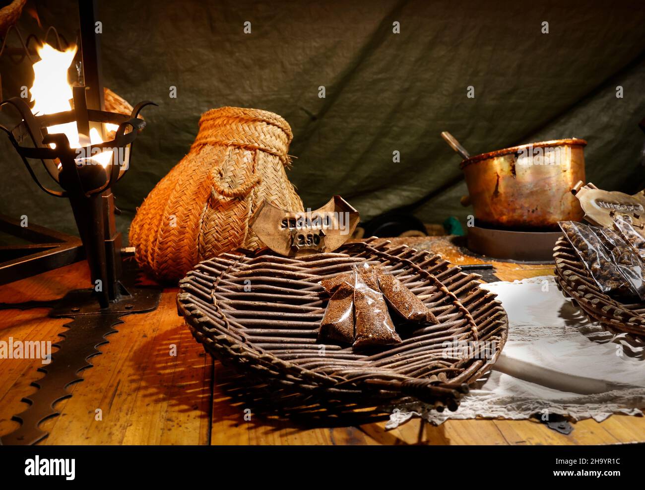 Roasted sesame seeds for sale in a Medieval Christmas market in the town of Vic in Catalonia, Spain Stock Photo