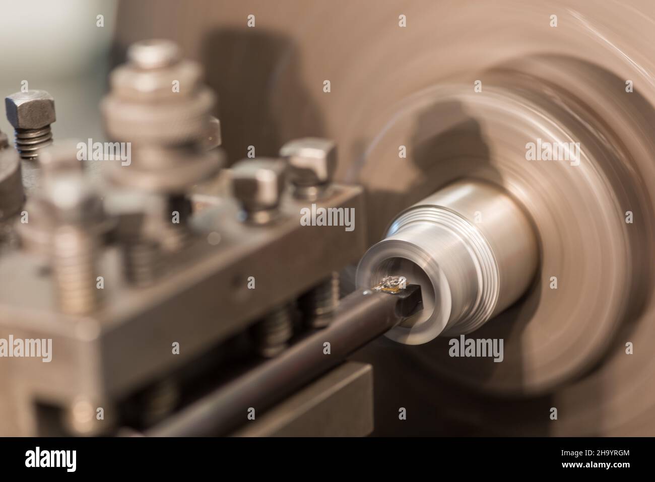 Using boring bar on metal on lathe Stock Photo Alamy