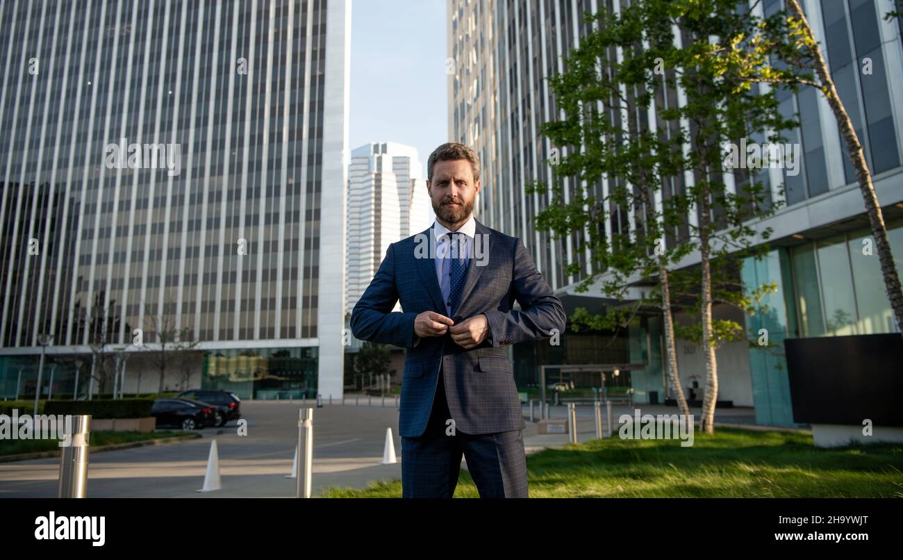 business success. successful man in businesslike suit. entrepreneur ...