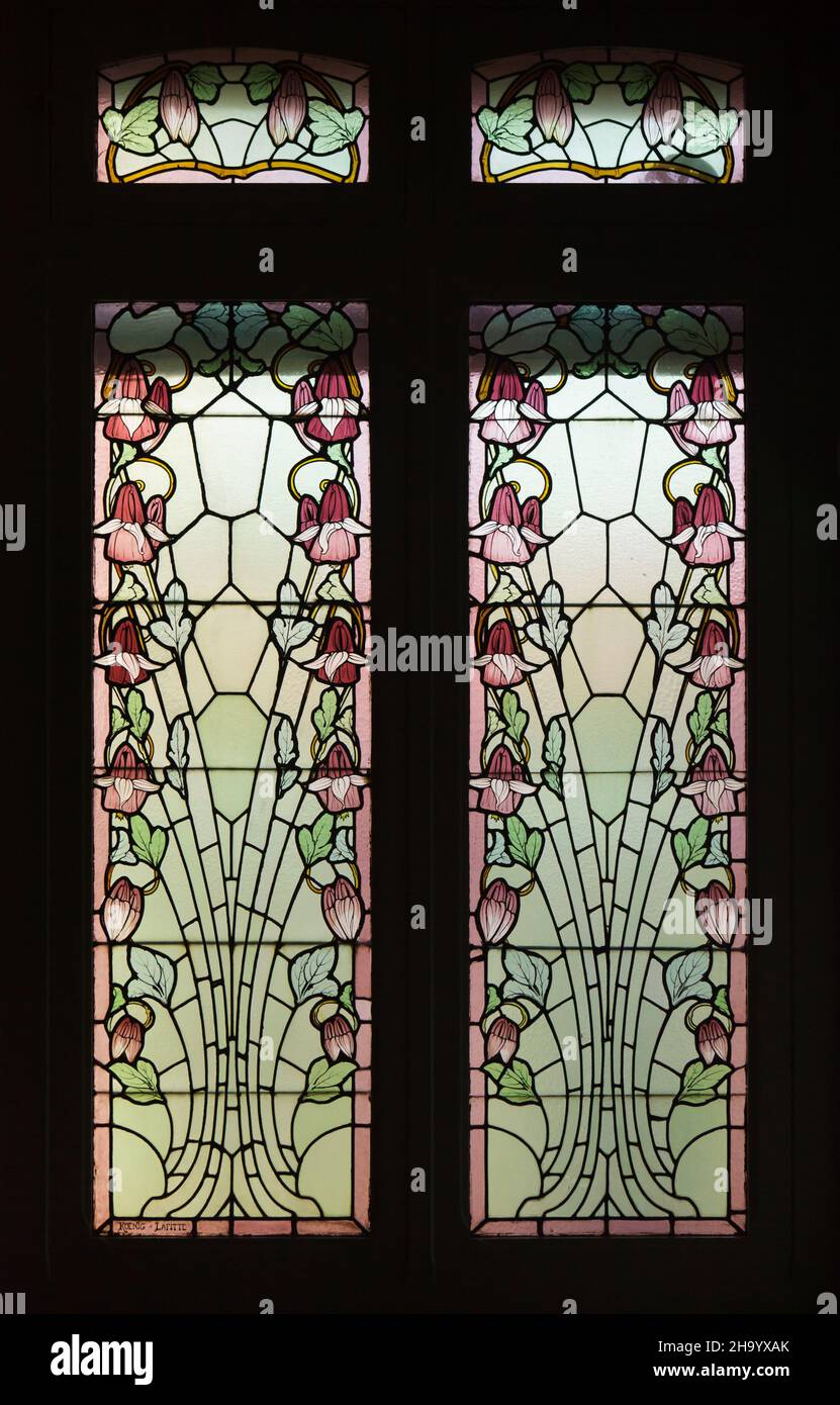 Art Nouveau stained glass window 'Les Ancolies' ('The Columbines') designed by Koenig et Lafitte (1911) on display in the Museum of the Nancy School (Musée de l'École de Nancy) in Nancy, France. Stock Photo