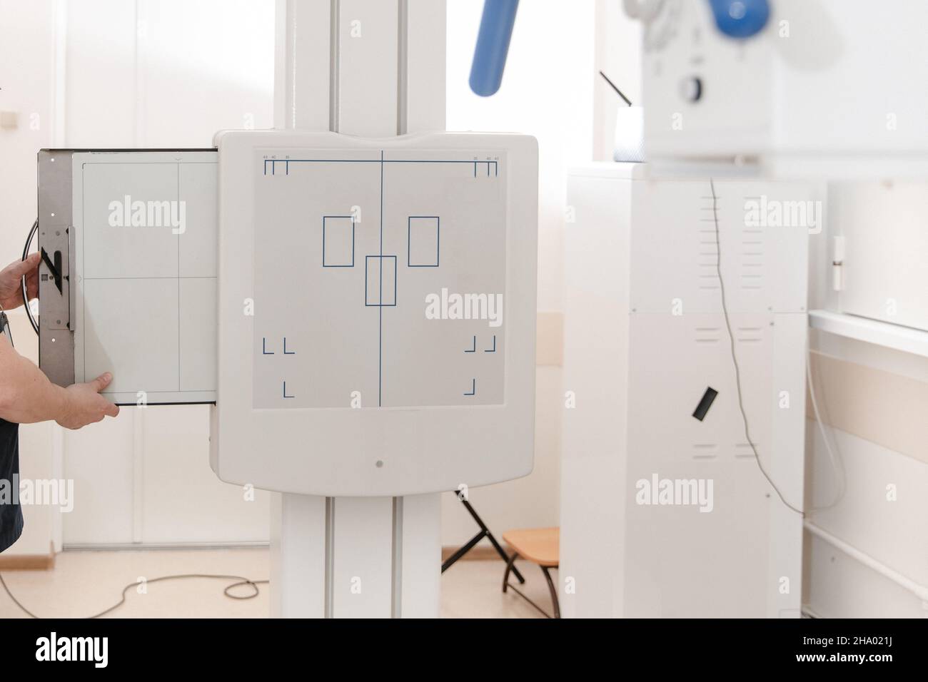 Xray department in modern hospital. Radiology room with scan machine