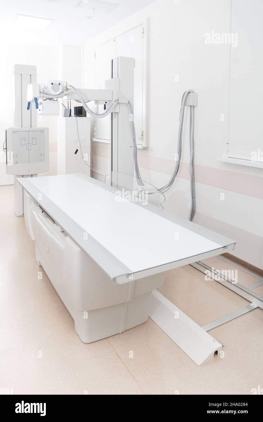 Xray department in modern hospital. Radiology room with scan machine