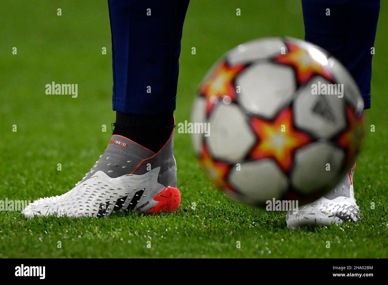 Torino, Italy. 08th Dec, 2021. Adidas predator shoes and pyrostorm ball are  seen during the warm up prior to the Uefa Champions League group H football  match between Juventus FC and Malmo