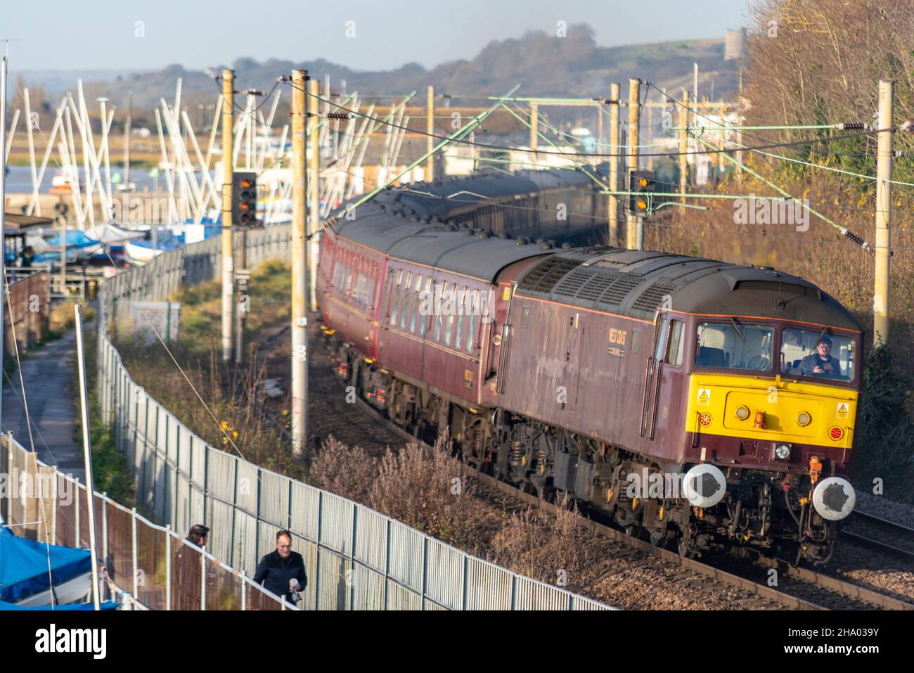 Vintage Class 47 diesel locomotive with special charter train passing Chalkwell, Southend on Sea, Essex, UK. West Coast Railways British Rail Class 47 Stock Photo