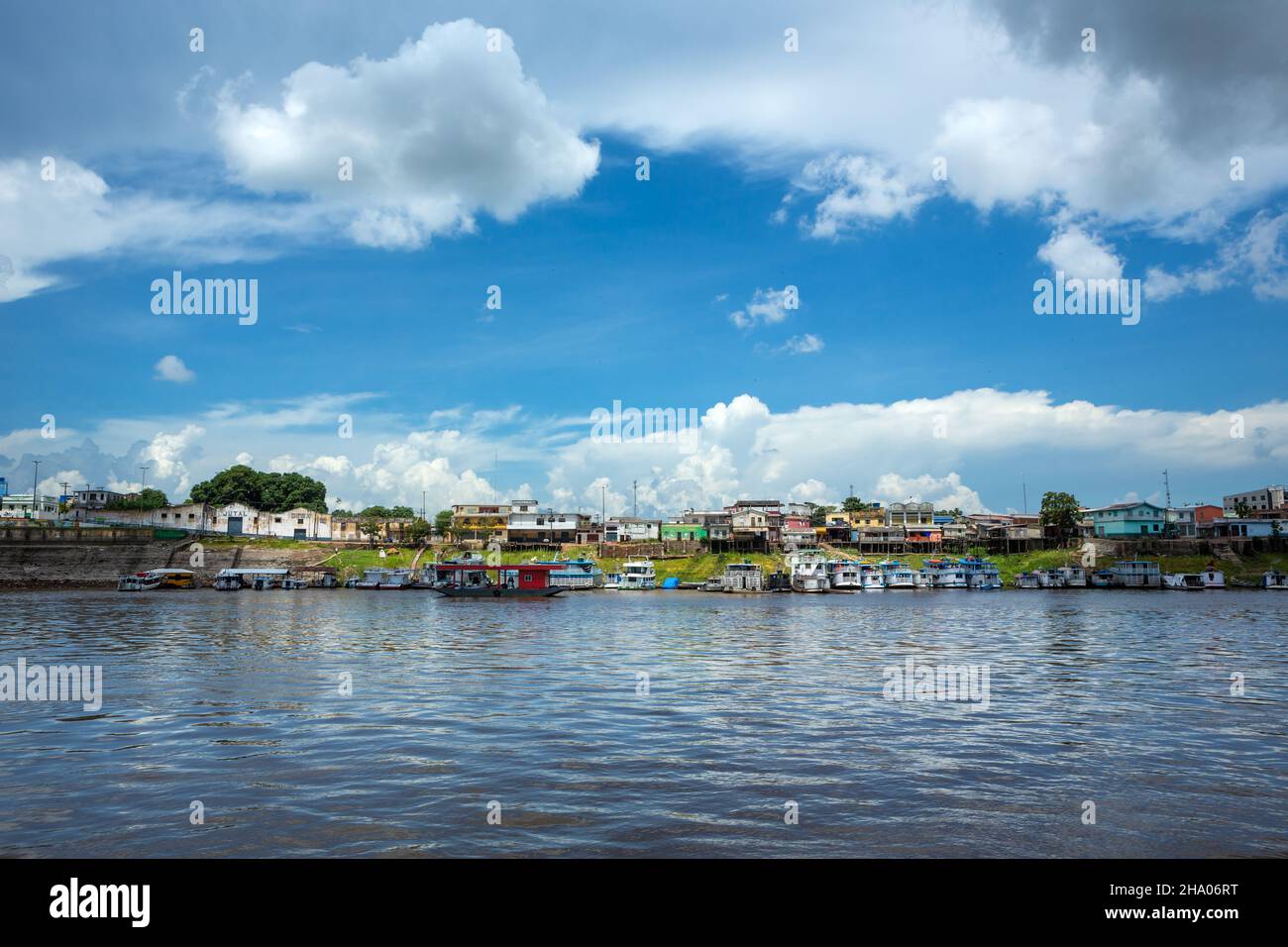 Beautiful view of Amazon River and Itacoatiara city skyline in summer sunny day with clouds. Manaus, Amazonas, Brazil. Concept of environment, ecology Stock Photo