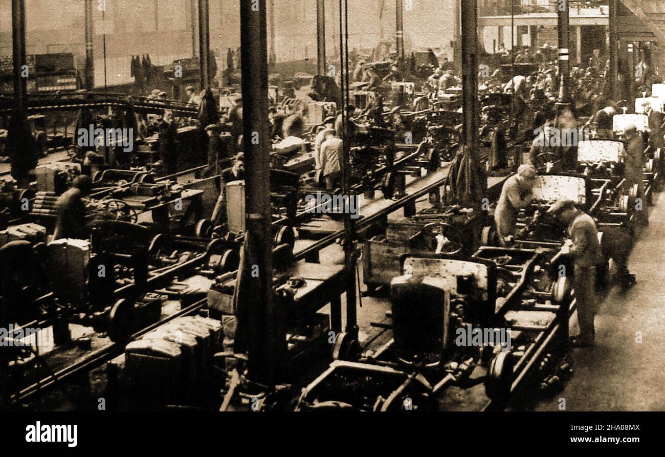 An old photograph showing  work taking place on the  Morris Motors Production Line, UK, 1934 Stock Photo