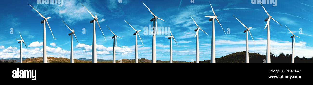 Wind mills farm and sunset landscape.Renewable energy and wind turbines. Stock Photo