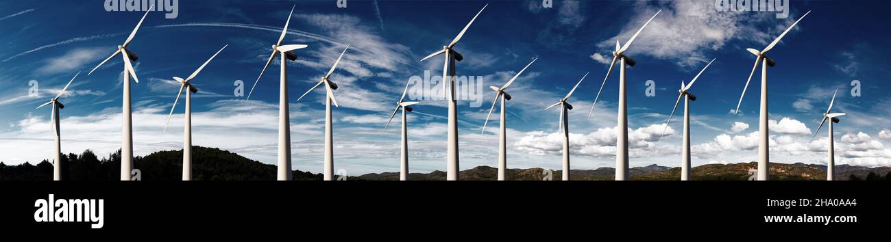 Wind mills farm and sunset landscape.Renewable energy and wind turbines. Stock Photo