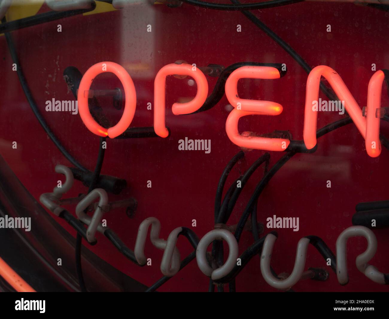 OPEN spelled in neon sign Stock Photo