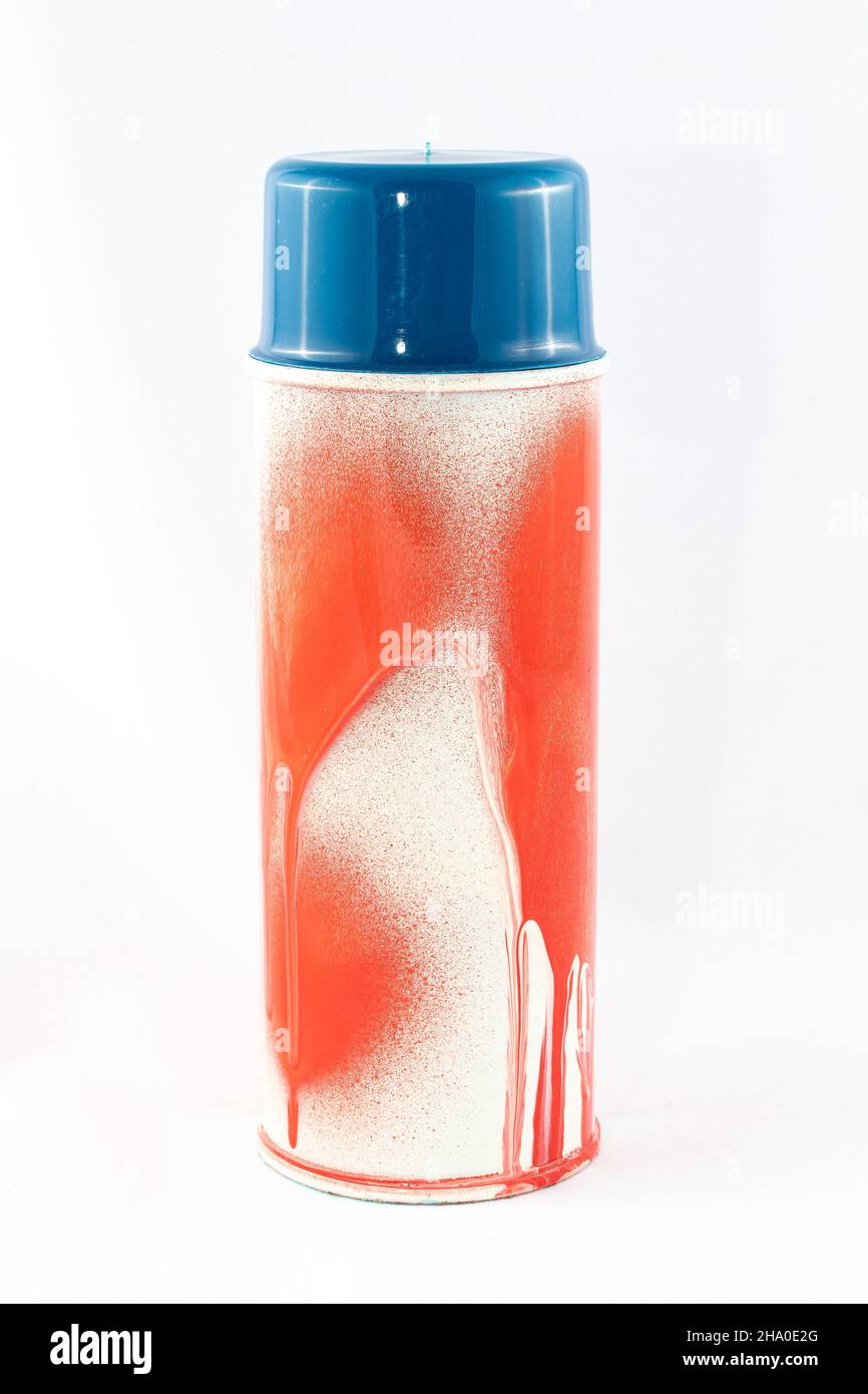 Red Spray Paint Can on White Background - Close-Up Shot Stock Photo