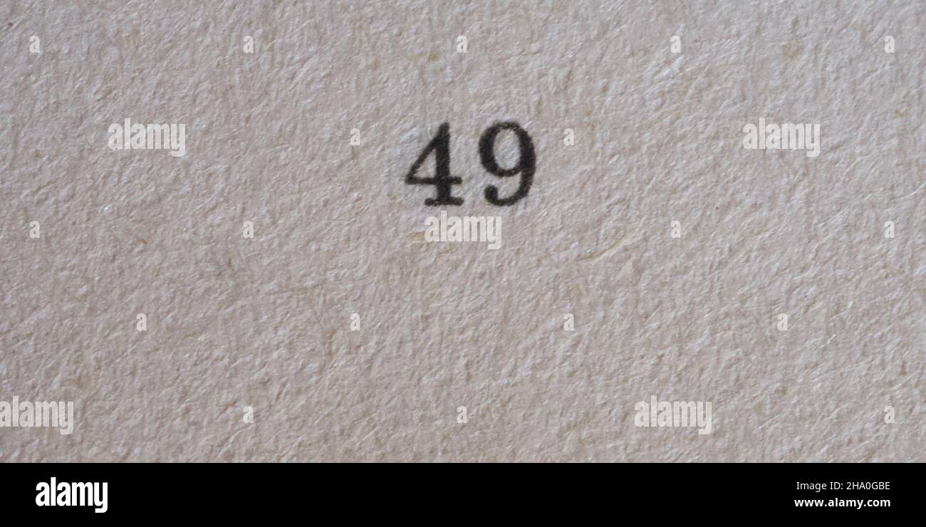 The number 49 printed on a piece of paper. Paper texture. Stock Photo