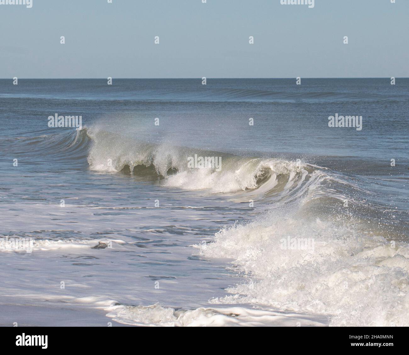 Surf breaks on near the beach in Nags Head, NC. Stock Photo