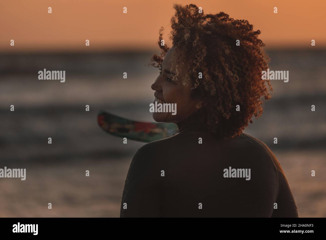 Side view old woman surfboard hi-res stock photography and images - Alamy