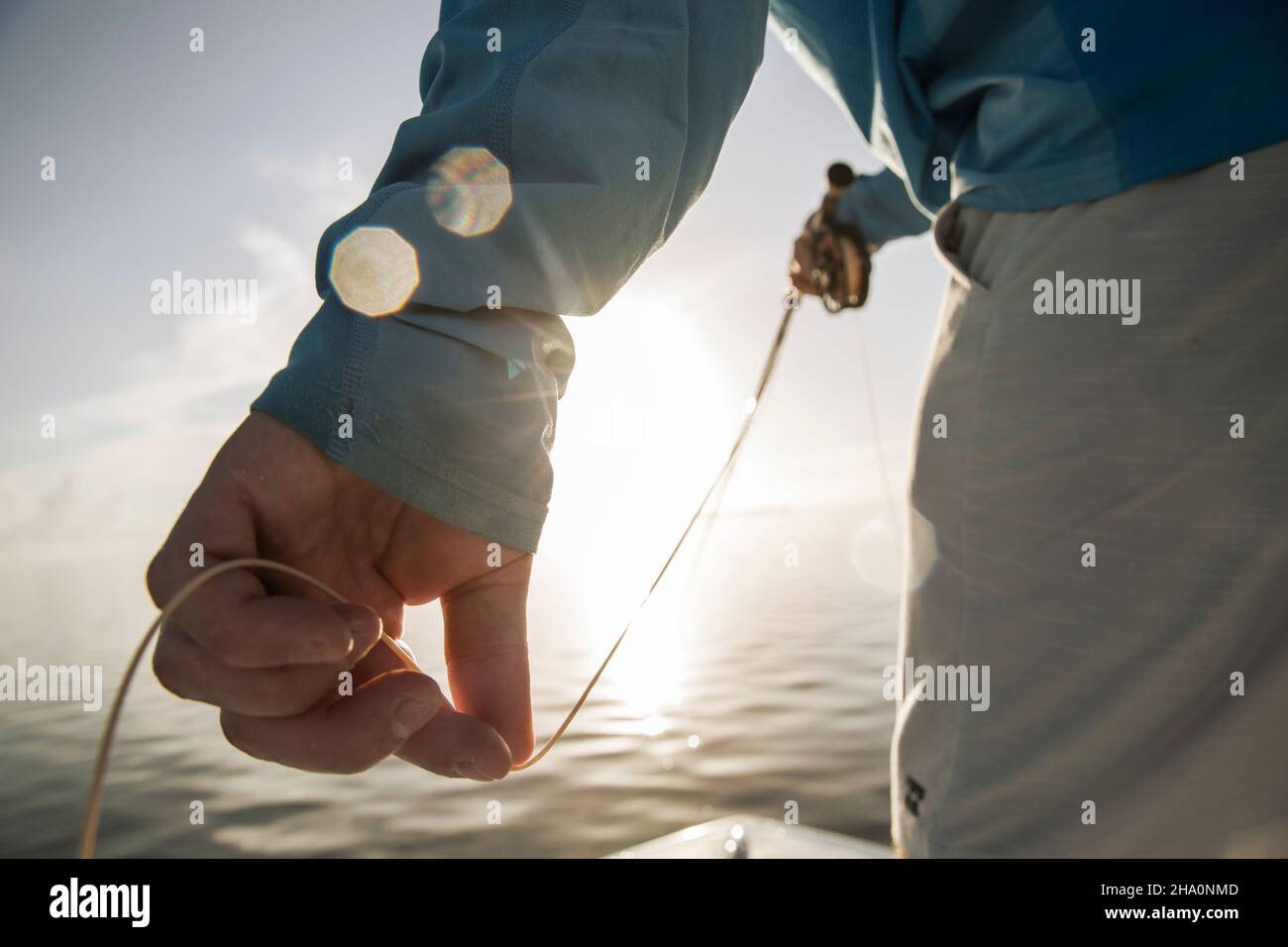 Hand of Man Hold a Fishing Rod for Catching Stock Photo - Image of happy,  person: 215074008