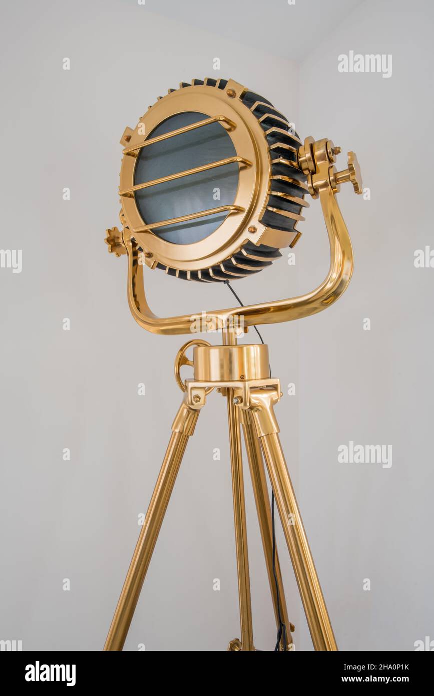A Nautical, Modern, Designer, Studio, Floor Lamp With A Tripod Finished In A Brass Look With A Black Tripod Style Stand 2ha0p1k