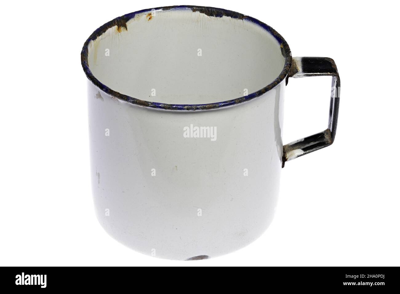 vintage enamel mug isolated on white background Stock Photo