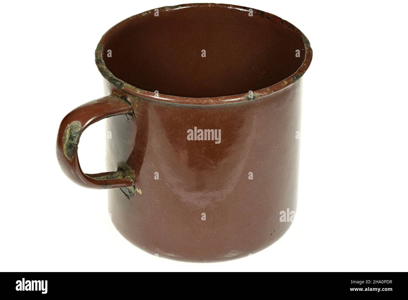 vintage enamel mug isolated on white background Stock Photo
