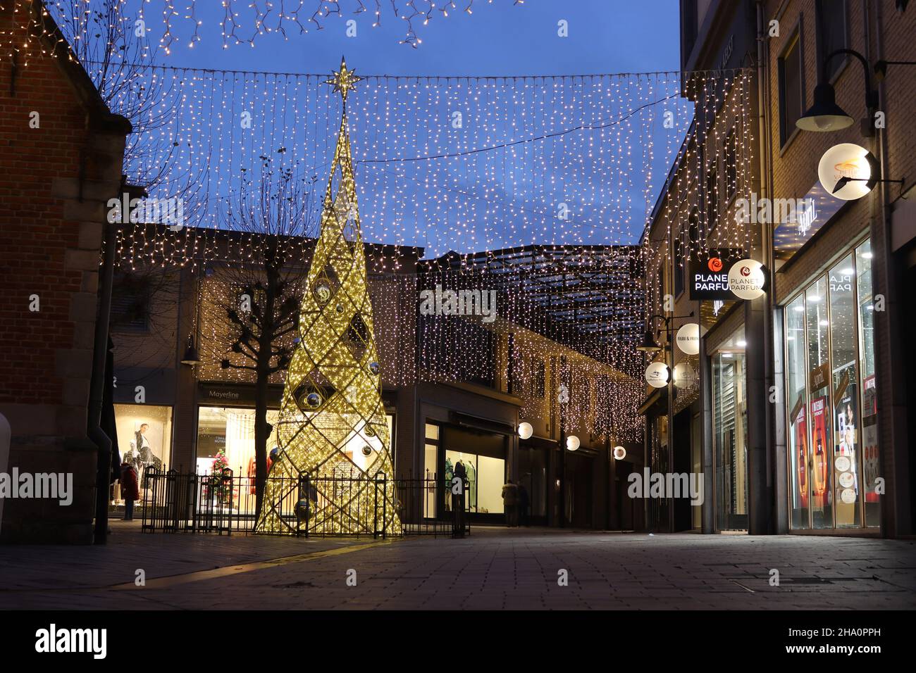 AALST, BELGIUM, 5 DECEMBER 2021: View of Pieter van Aelst Shopping Centre in Aalst, East Flanders at night during the holiday season. It is one of the Stock Photo