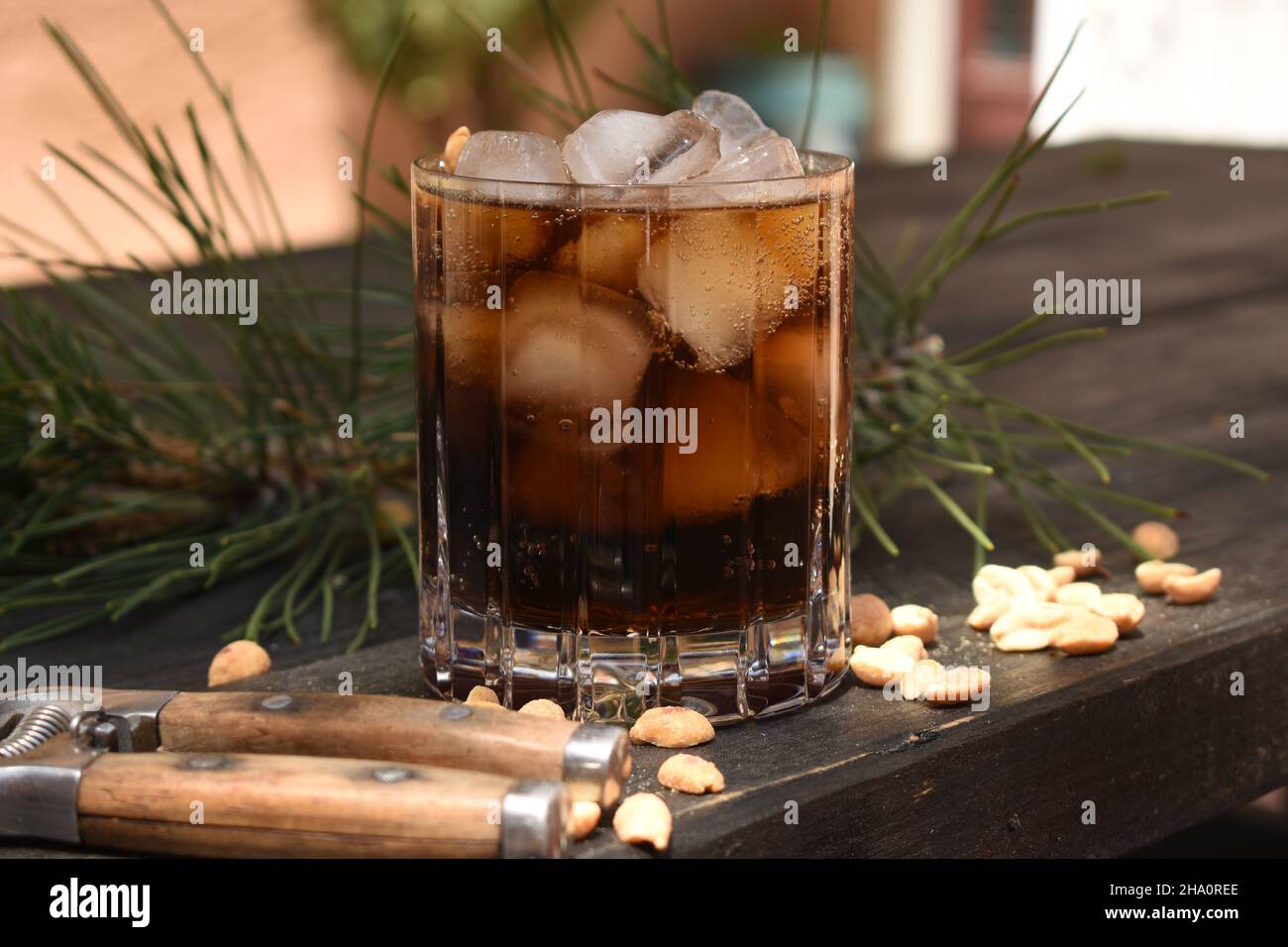 Bourbon, peanuts and Coke Stock Photo Alamy
