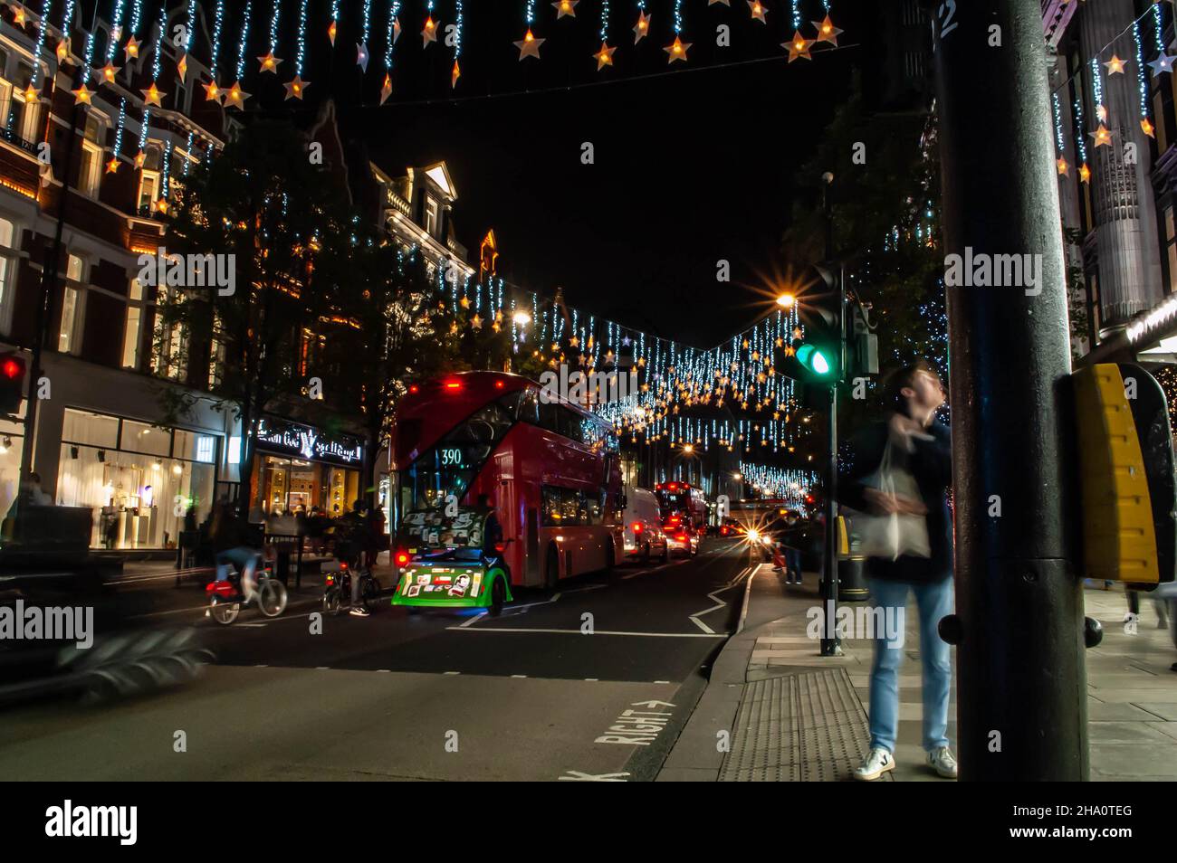OXFORD STREET, LONDON, ENGLAND- 14 November 2021: Oxford Street with Christmas lights at night Stock Photo