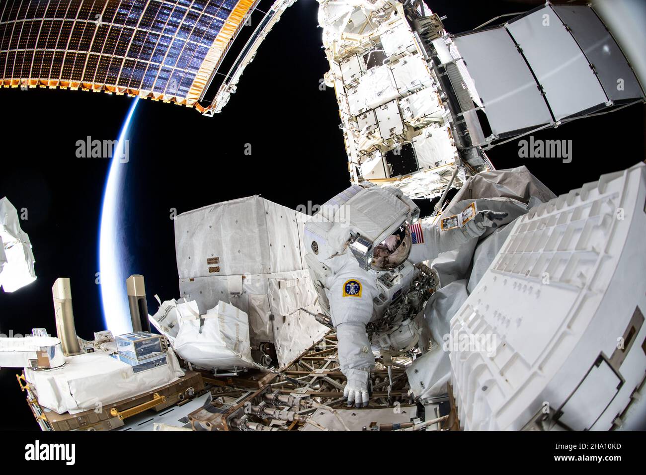 International Space Station, Earth Orbit. 02 December, 2021. NASA astronaut Kayla Barron during her six-hour and 32 minute spacewalk to replace a failed antenna system on the International Space Station Port-1 truss structure, December 2, 2021 in Earth Orbit.  Credit: Thomas Marshburn/NASA/Alamy Live News Stock Photo